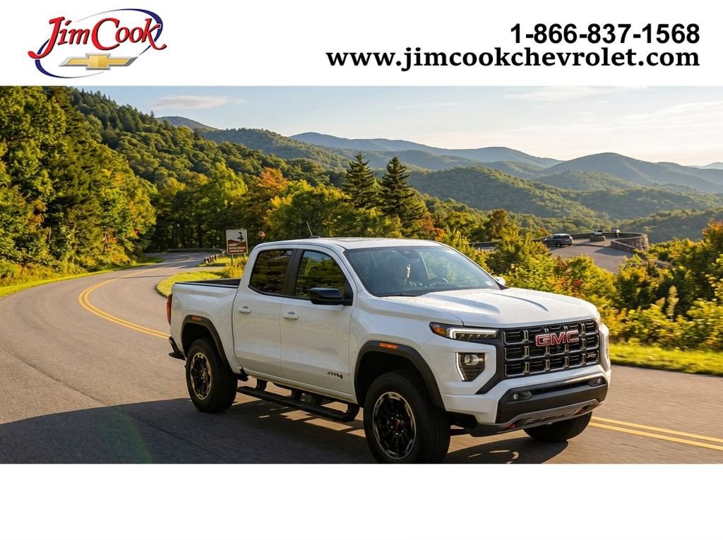 2026 GMC Canyon AT4 in Summit White — front three-quarter view