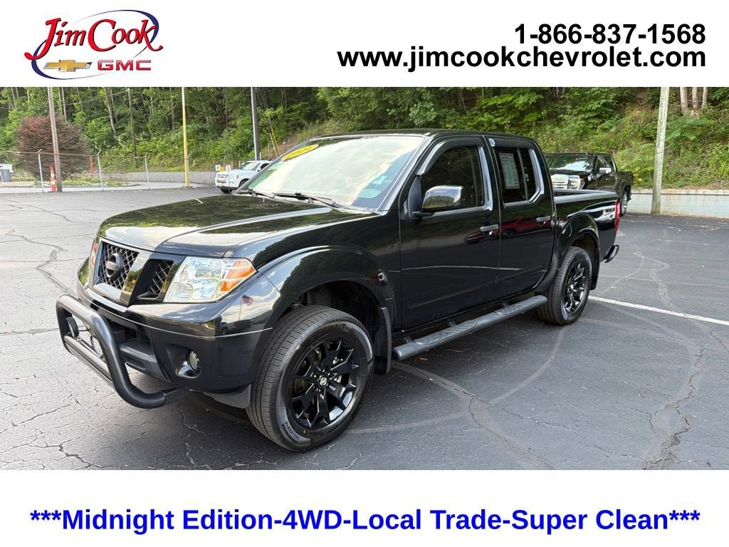 2021 Nissan Frontier Crew Cab SV 4x4 in Black — front three-quarter view